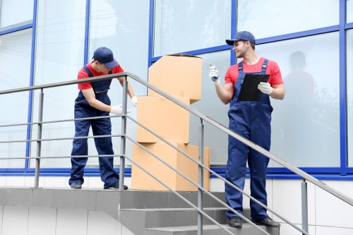 Team member assessing a service issue for a local moving company