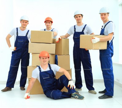 Removal team loading furniture for an Eastcote house move